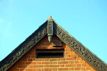 Decorative bargeboard at the gable of the small property January 2011